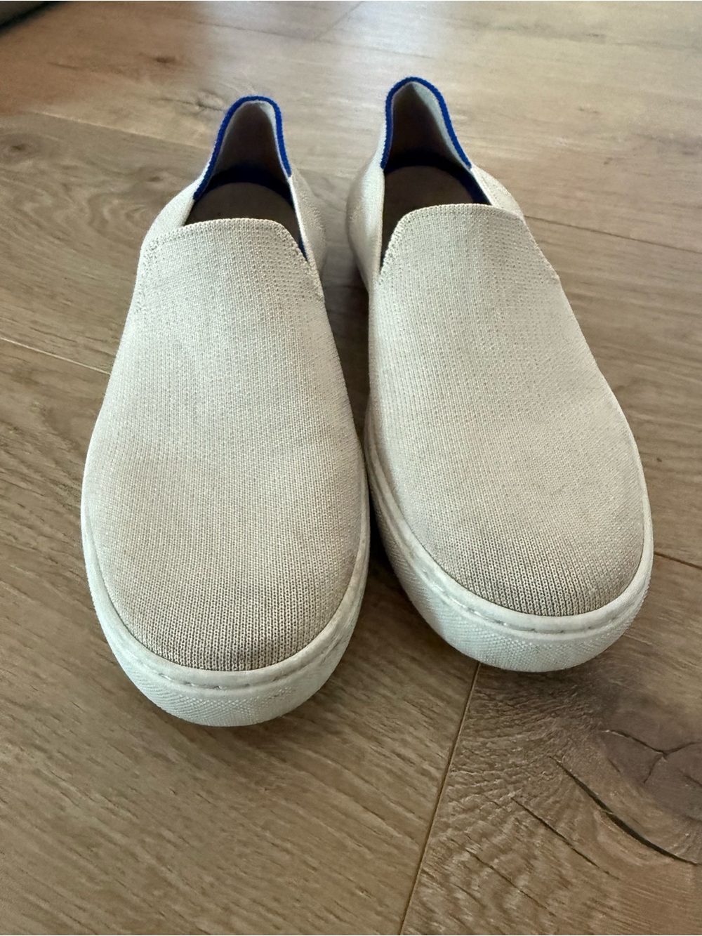 Rothy's Slip-On Sneakers in Beige with Blue Trim